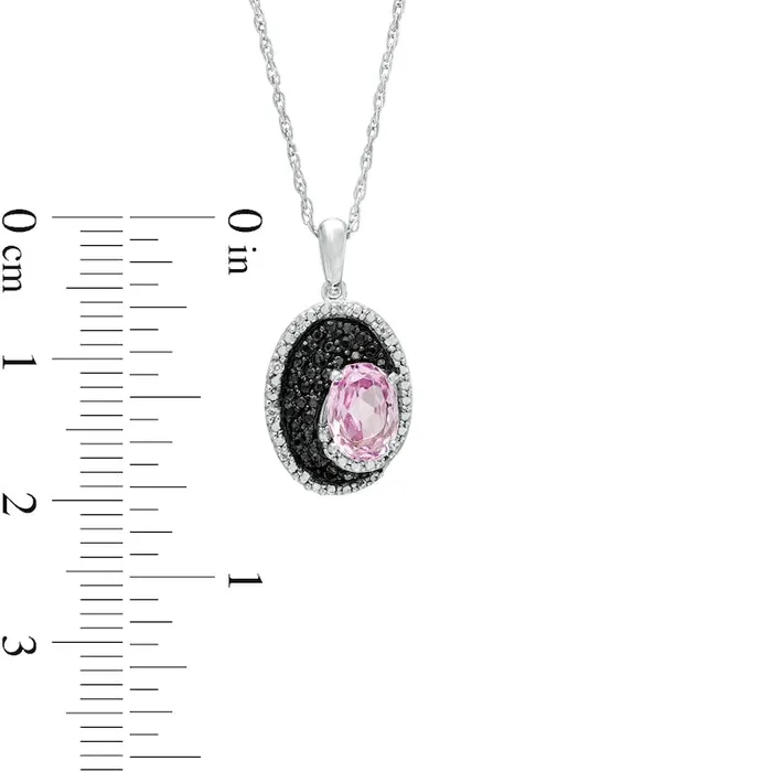 Necklaces Goldia Oval labCreated Pink Sapphire and 01 CT TW White and Enhanced Black Natural Diamond Pendant in Sterling Silver Necklaces Goldia Oval labCreated Pink Sapphire and 01 CT TW White and Enhanced Black Natural Diamond Pendant in Sterling Silver