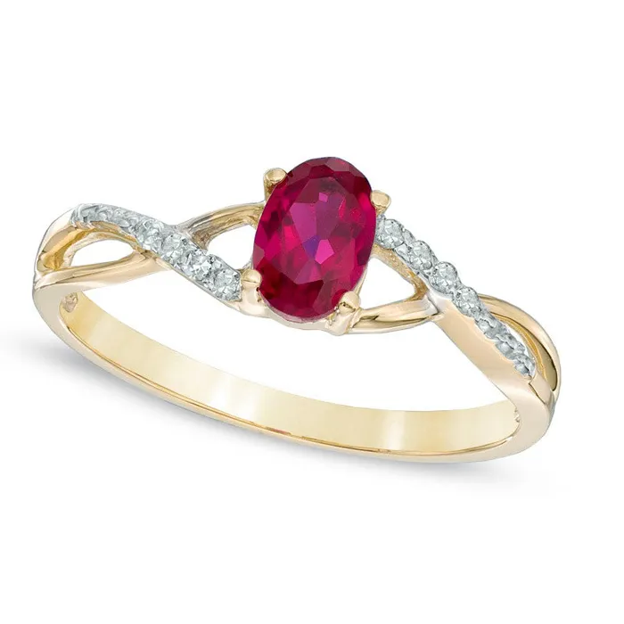 Rings Oval LabCreated Ruby and Diamond Accent Twist Engagement Ring in Solid 10K Yellow Gold Goldia Rings Oval LabCreated Ruby and Diamond Accent Twist Engagement Ring in Solid 10K Yellow Gold Goldia