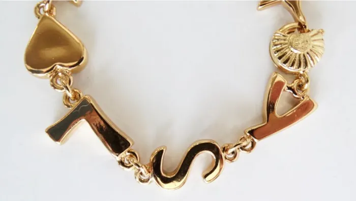 Vintage by Misty Yves Saint Laurent 1980s YSL Logo Bracelet Bracelets