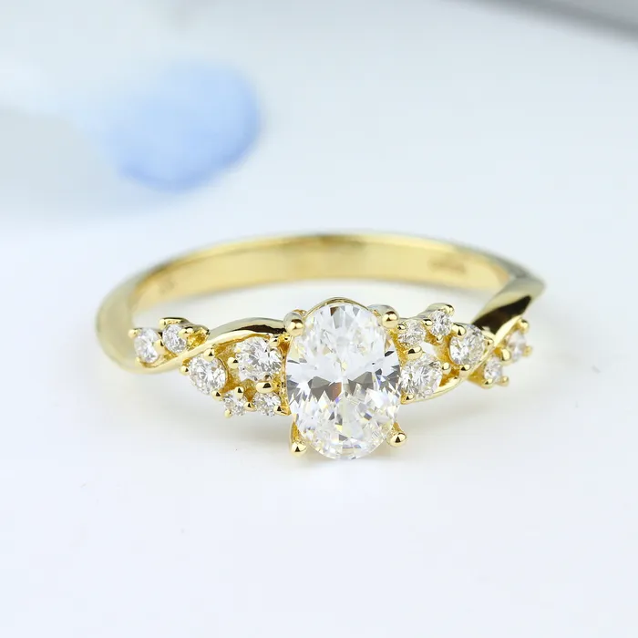 Rings Parade Twist Band w Round Diamonds Oval Center Engagement Ring Parade Designs Rings Parade Twist Band w Round Diamonds Oval Center Engagement Ring Parade Designs